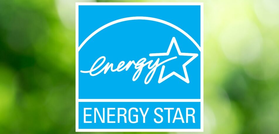 ENERGY STAR certified logo on a blurred green background, indicating energy-efficient windows.